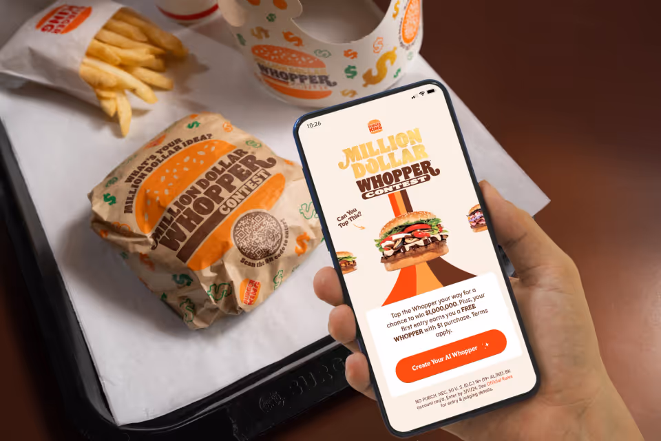 Burger King Million Dollar Whopper campaign artwork with wrapped Whoppers and campaign crowns on a red background